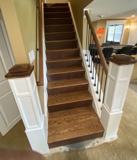 Oak staircase remodel with custom posts